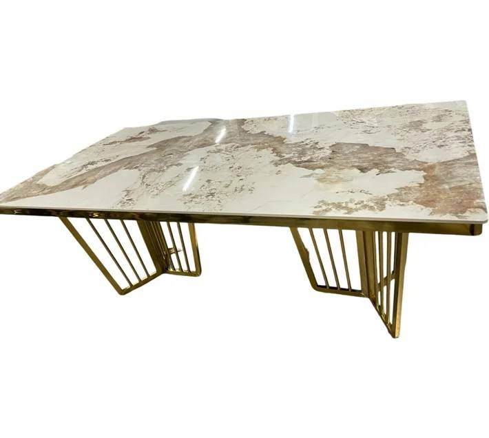 Marble-top table with gold geometric legs Dining Table