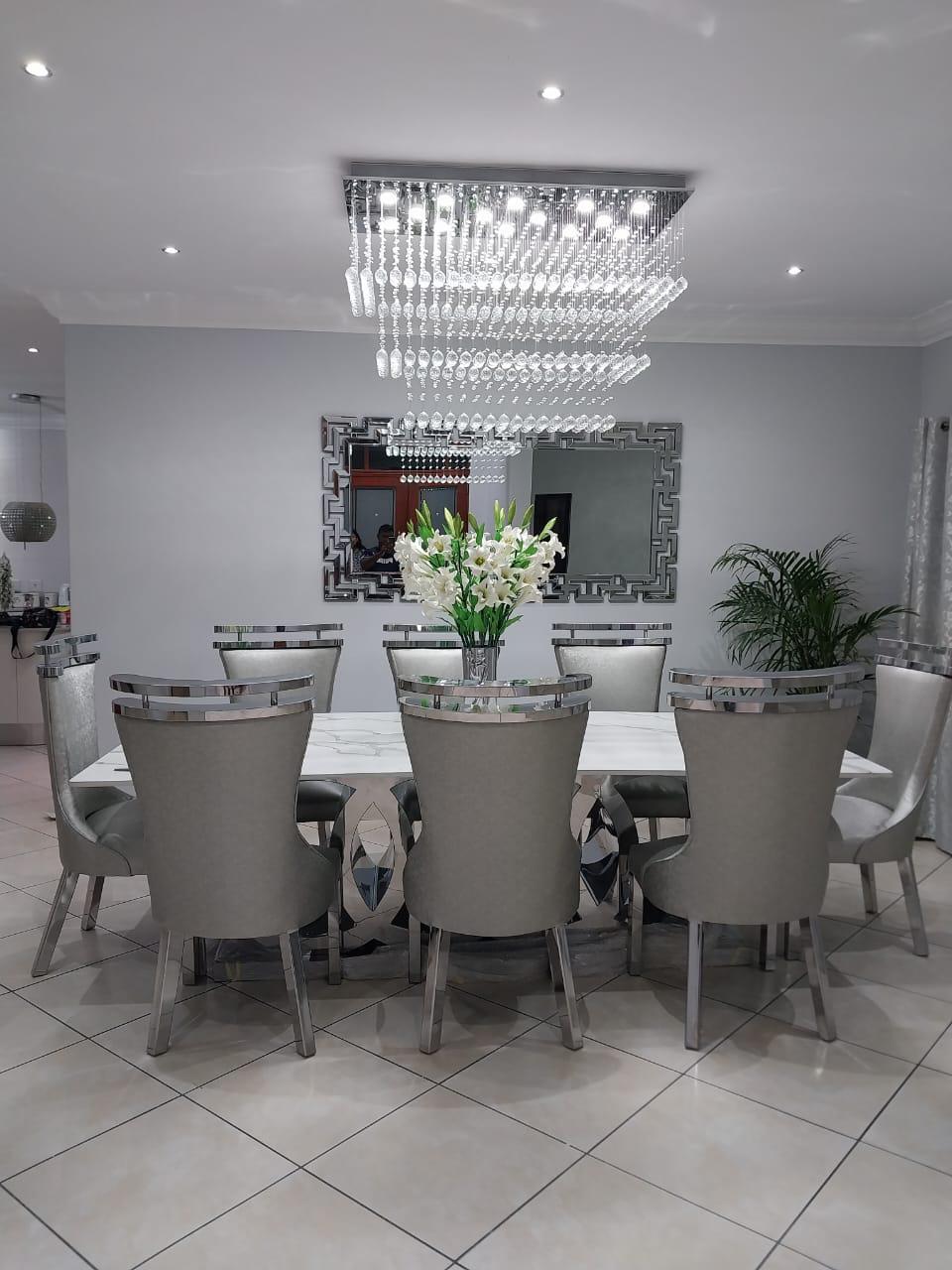 8-Seater Stainless Steel Dining Room Suite with Audi Table and a Quartz Top
