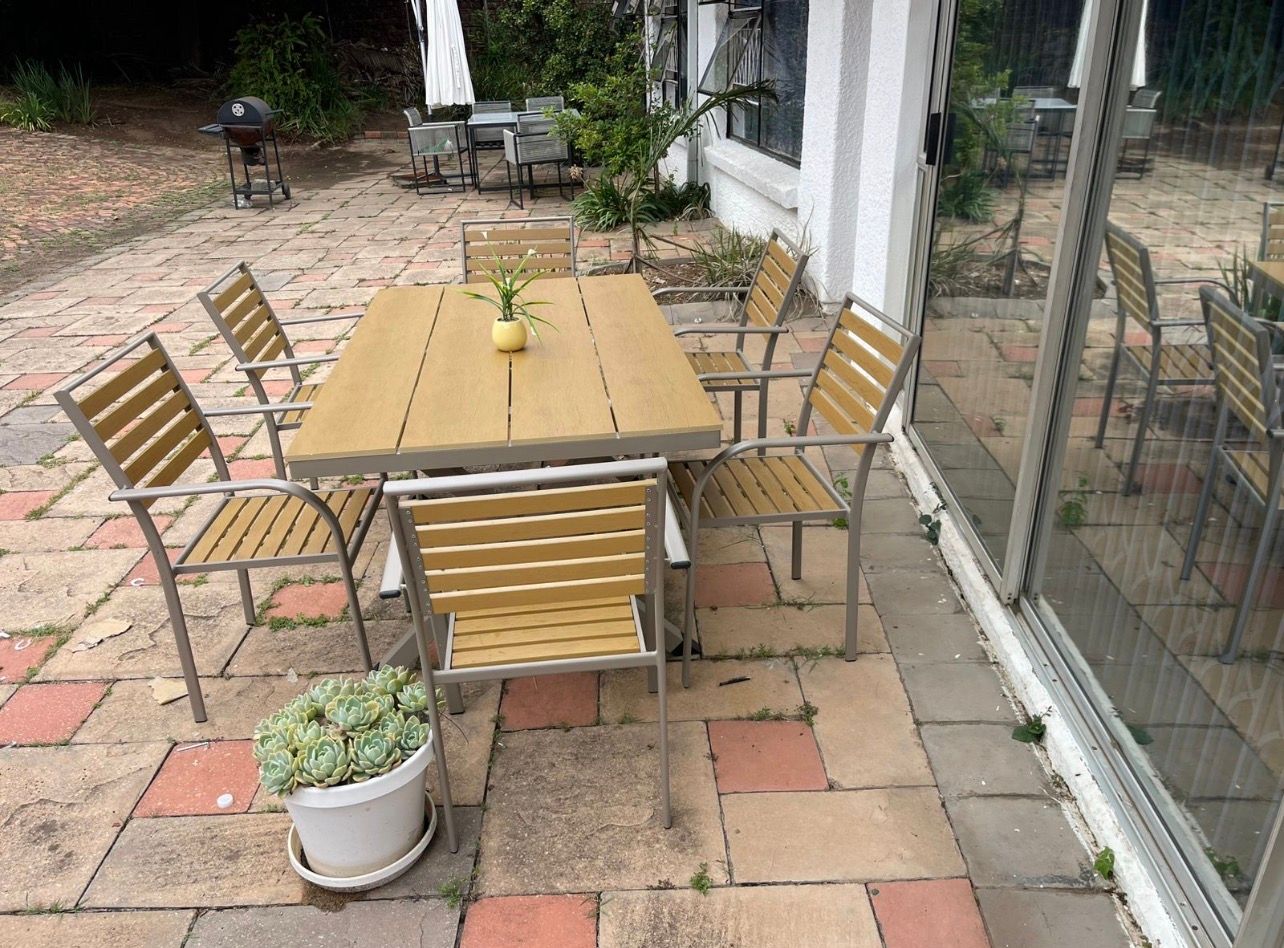 Engineered Wood table and chair set (comes with six chairs)